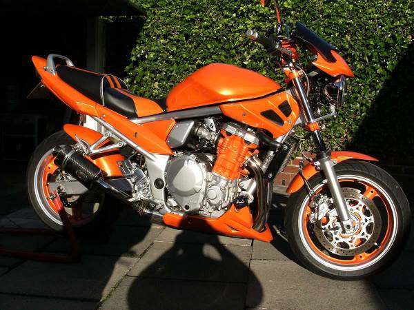Wheels, engine bay and panel paintwork on a Suzuki, finished in our low-bake oven.
