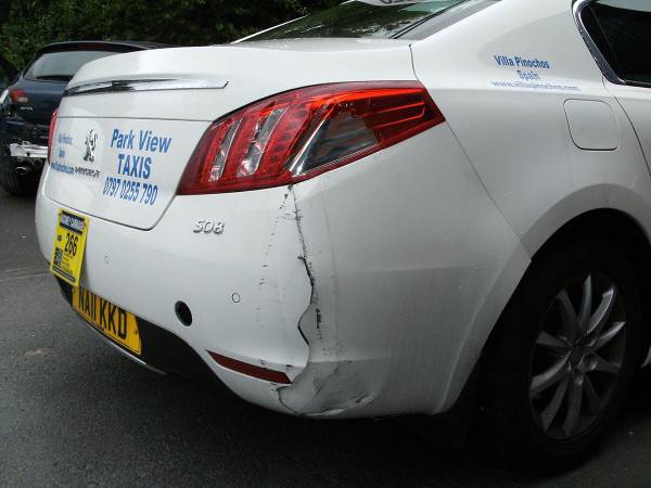 Commercial respray and livery refresh on a taxi, finished in our low-bake oven for a durable trade finish.
