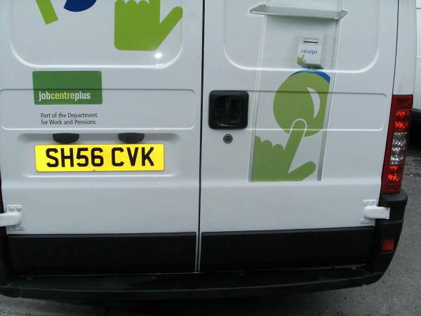 Repair and respray of a commercial van, finished in our low-bake oven.