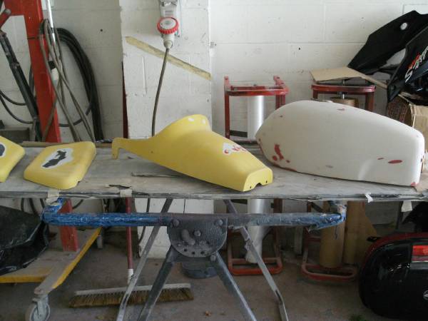 Custom paintwork on a motorcycle tank, finished in our low-bake oven for a hard-wearing, high-gloss result.