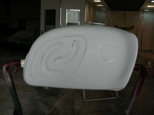 Custom black BMW engine-bay and tank paintwork, finished in our low-bake oven.